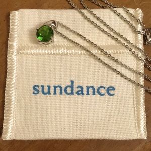 Silver necklace with green stone pendant